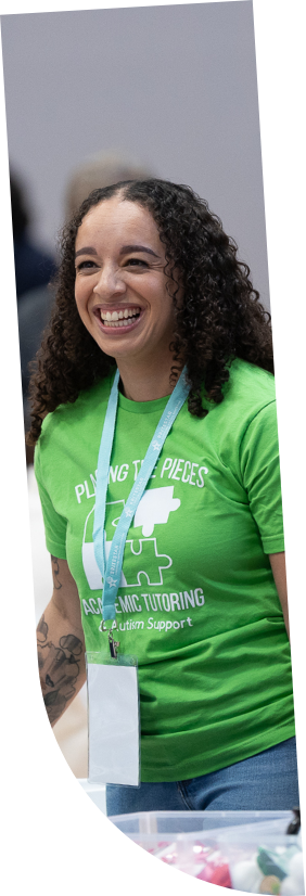 Woman smiling at exhibition booth